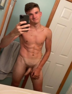 Nude boy with a big soft cock