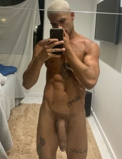 Nude stud with a huge cock