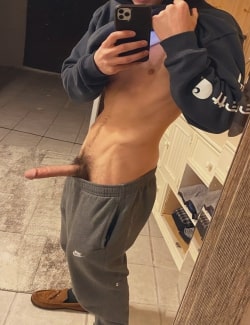 Cock out of grey sweatpants