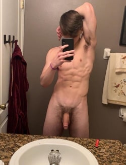 Muscle boy with a cut penis