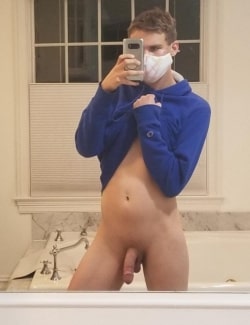 Masked boy with a shaved dick