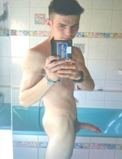 Slim nude boy with a big dick