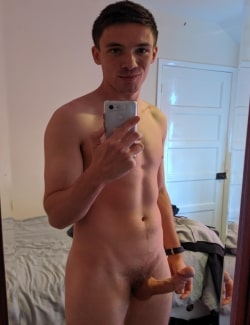 Nude boy with a curved cock