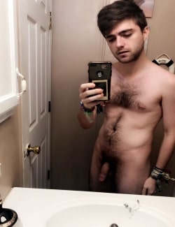 Hairy boy taking nude selfies