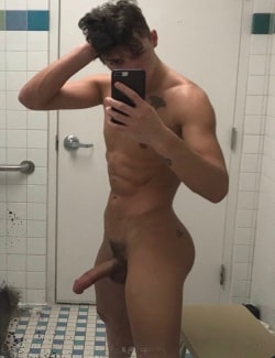 Muscle boy taking a nude selfie